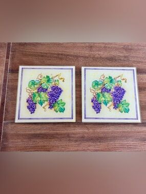 Two glass trivets grapes and vine theme